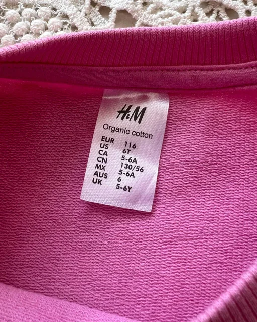 نمای داخل پیراهن دخترانه دورس صورتی طرح ساده h&m