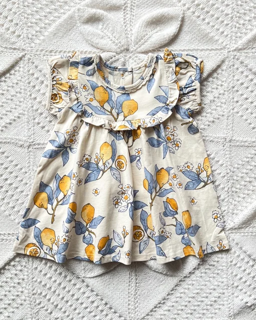 نمای روبرو پیراهن دخترانه سفید نخی طرح لیمو next | اسکای‌تاپ مرجع تخصصی خرید لباس بچگانه