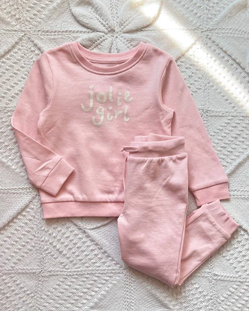 بلوز شلوار تو پنبه ای صورتی طرح متن orchestra