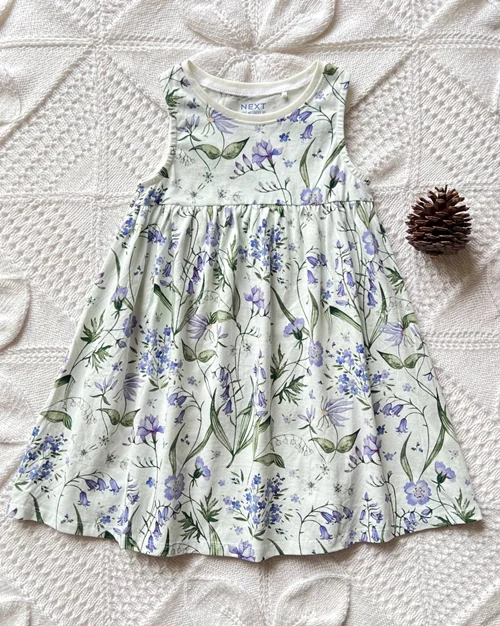 پیراهن نخی سفید طرح گل بنفش next