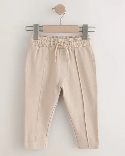 شلوار اسلش جودون سوزنی کرم  next