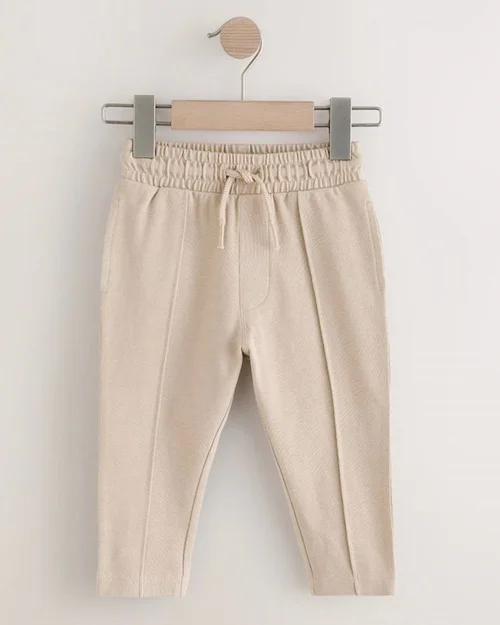 شلوار اسلش جودون سوزنی کرم  next